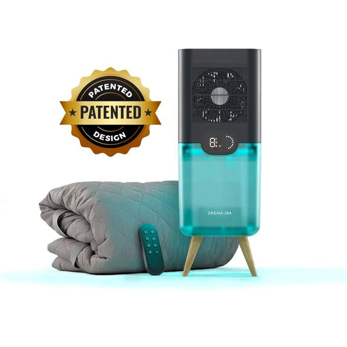 Dreamora Luna cooling tower with a glowing teal tank, fan and display on wooden legs, beside the folded two-sided pad on a white background