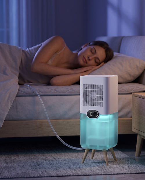 Woman sleeping next to the Luna unit at night